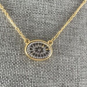 Avon Gold Necklace with Black and Silver Oval Pendant